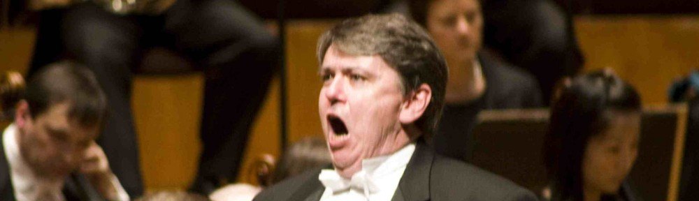 James Hancock singing with orchestra